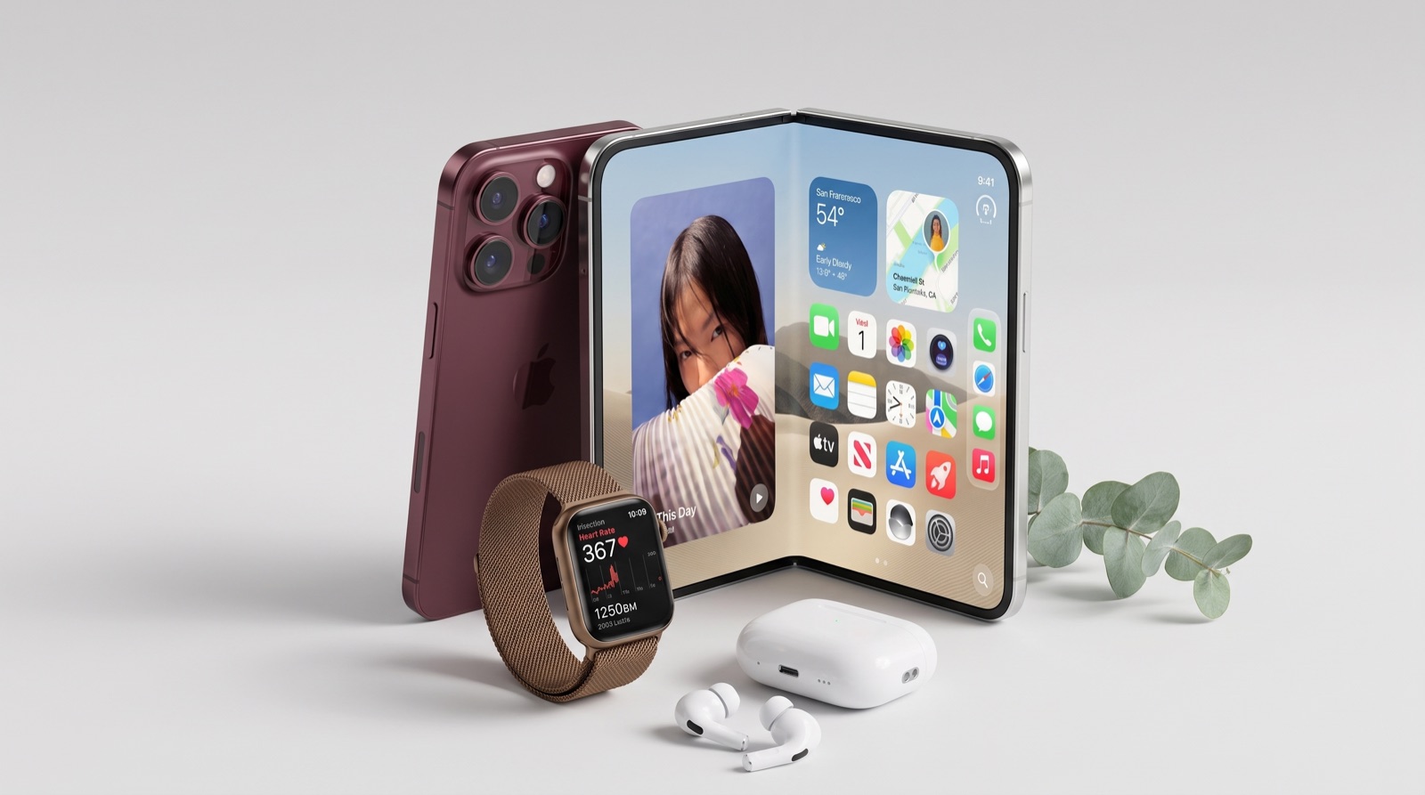 Aufgeklapptes Falt-Smartphone mit Startbildschirm, daneben eine Smartwatch und Ohrhörer